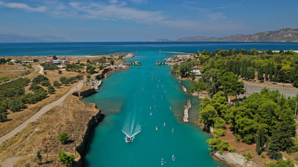 Aerial bird's eye view photo taken by drone of stand up paddle surfers in annual SUP crossing...