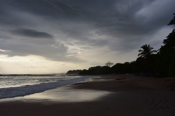 Sunset with storm on the beach of Costa Rica.