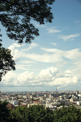 Big city behind, abstract urban landscape with architecture elements and skies