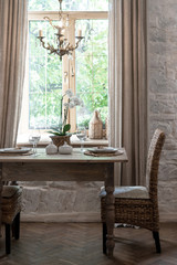 Table setting with tableware and white orchid
