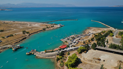 Aerial bird's eye view photo taken by drone of stand up paddle surfers in annual SUP crossing competition in Corinth Canal, Greece