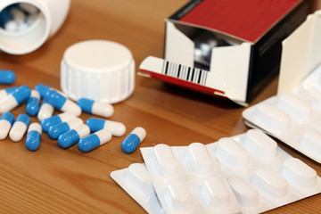 Close-up of different pharmaceutic pills, tablets and packages