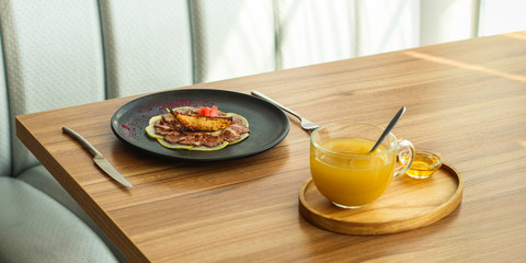 duck meat carpaccio with pear flambe (tasty snack, aperitif) menu concept. food background. copy...