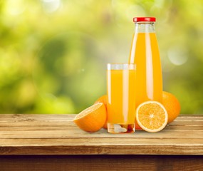 Orange juice and slices of orange on background © BillionPhotos.com