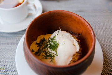 dish fried potato pancakes sour cream greens