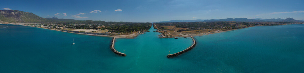 Aerial photo taken by drone of Corinth Canal of Isthmos or Isthmus connecting mainland with Peloponnese, Greece