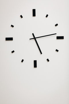clock in white wall