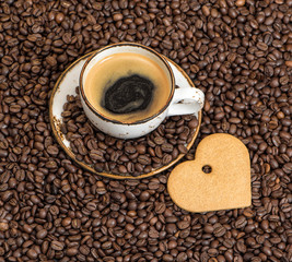 Cup coffee heart cake Love concept Beans background