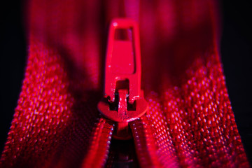 zipper on red background