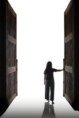 Woman open the big door into the white light