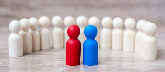 Red and blue businessmen with crowd of wooden men. Candidate, leadership, business, team, teamwork and Human resource management concept