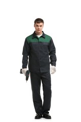 Fototapeta premium Man in working clothes with drill isolated shot