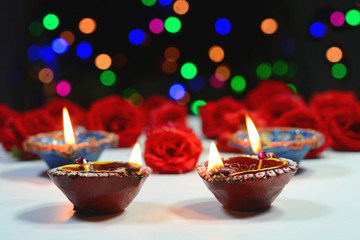Oil lamps and flowers decorated for Diwali festival