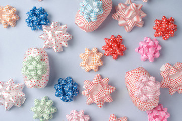 Pastel color of craft ribbon on the blue floor