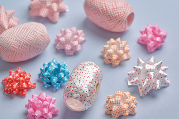 Pastel color of craft ribbon on the blue floor