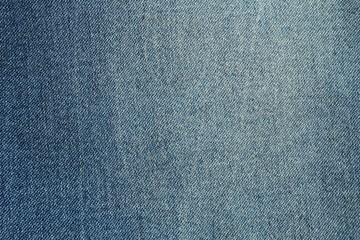 Abstract denim textile background or texture with space for design and text