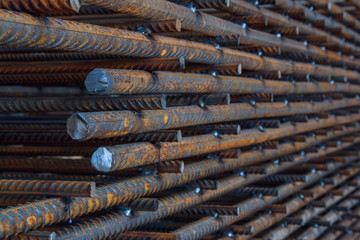 Industrial background. Rebar texture. Rusty rebar for concrete pouring. Steel reinforcement bars. Construction rebar steel work reinforcement. Closeup of Steel rebars.