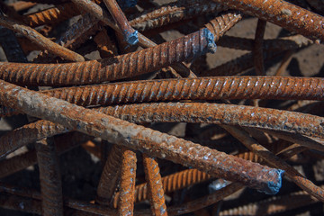 Industrial background. Rebar texture. Old rusty rebar for concrete pouring. Steel reinforcement...