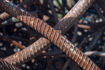 Industrial background. Rebar texture. Old rusty rebar for concrete pouring. Steel reinforcement...