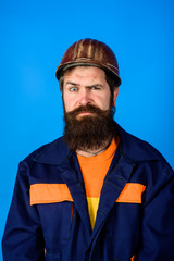 Mechanical worker. Bearded man in suit with construction helmet. Portrait of handsome engineer. Construction worker in hardhat. Business, industry, technology - builder concept. Builder in hard hat.