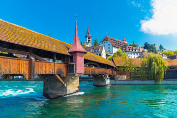 Lucerne / Switzerland - July 4th, 2019: The Spreuer Bridge (Spreuerbrücke) over the river Reuss in...