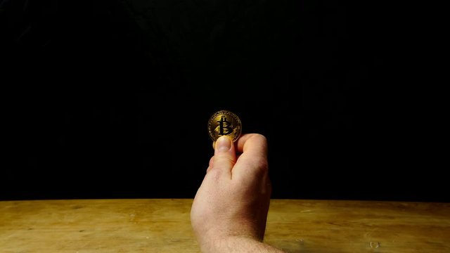 Dolly Push In On Man Holding Gold Bitcoin Btc Cryptocurrency Coin In Hand