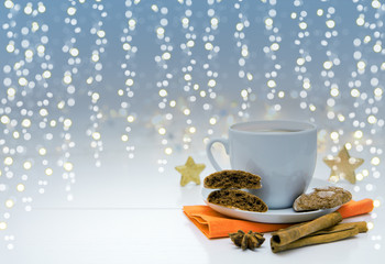 Christmas chocolate Cookies with garland and coffee cup.