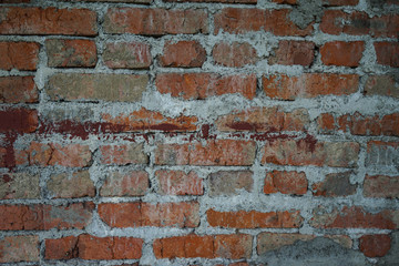 Grunge dirty old brick stone wall. construction of warm brick houses.