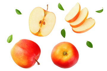 red apples with slices and green leaves isolated on a white background. top view