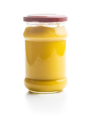Yellow mustard in jar.