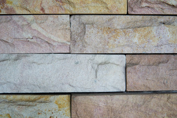 Beautiful color bricks or stones background of a wall decoration.