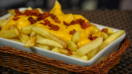 Crisp french fries with cheddar an bacon