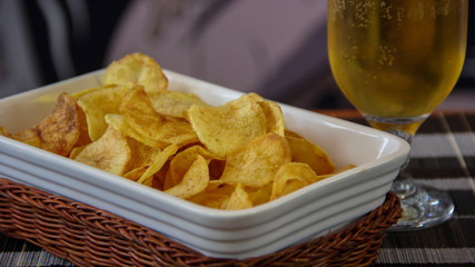 Homemade potato chips served in a tray