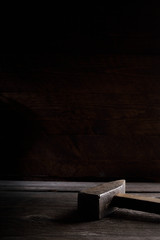 Different workpieces on a wooden background. Hedge wrenches keys, hammer