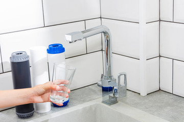 The tap from which water flows. Quenching thirst. Water problems in some countries.The glass is filled with water.