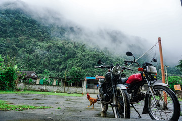 Parked motorbikes in a village in Vietnam