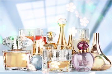 Aromatic Perfume bottles on background