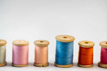 Spools of thread on a white background