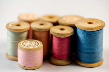 Spools of thread on a white background