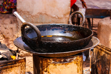extremely used and dirty frying pan, Indian street food, rajasthan, India