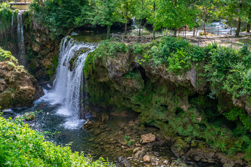 Waterfalls of Korana river in Rastoke village, near Slunj, Croatia, beautiful landscape with green trees on sunny summer day