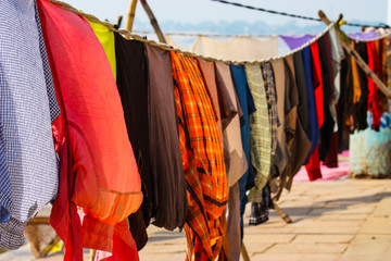 detail of clothes hung out to dry on the banks of the gange in Varanasi, Uttar Pradesh, India