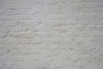 Grunge dirty old brick stone wall. construction of warm brick houses.