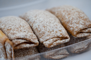 Delicious pastries in plastic packaging