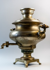 Old samovar on a white background