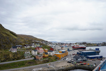Fototapeta na wymiar Port of Honningsvag in Finnmark Norway: base for the cruise ships and tourist as starting point for their trip to the North Cape the most northerly point of Europe.