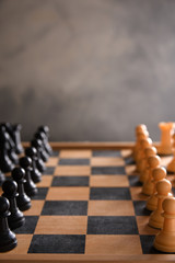 board game for ideas and strategy, business success concept. hand of businessman man moving chess figure in competition success play.  strategy, management or leadership concept.playing photographed 