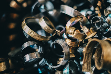 Steel scrap processing. Aluminum shavings after processing metal parts on a CNC lathe.