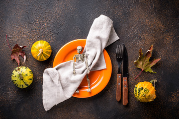 Halloween table setting with pumpkin