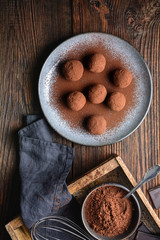 Delicious treat, homemade chocolate truffle covered in cocoa powder